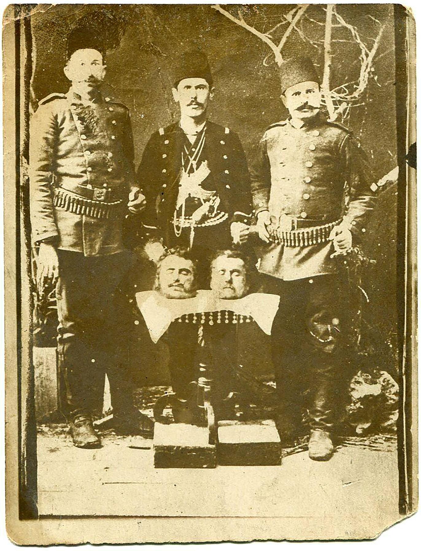 A group of people posing for a photo
Description automatically generated with medium confidence