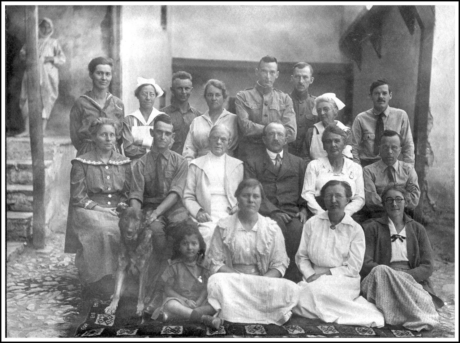 A group of people posing for a photo
Description automatically generated