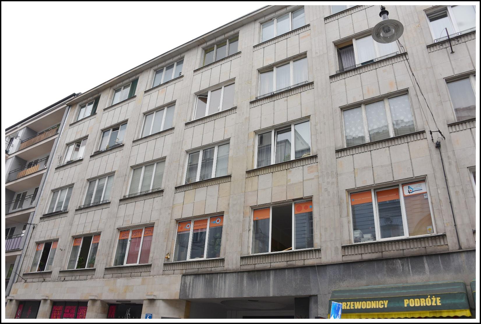 A building with many windows
Description automatically generated with low confidence