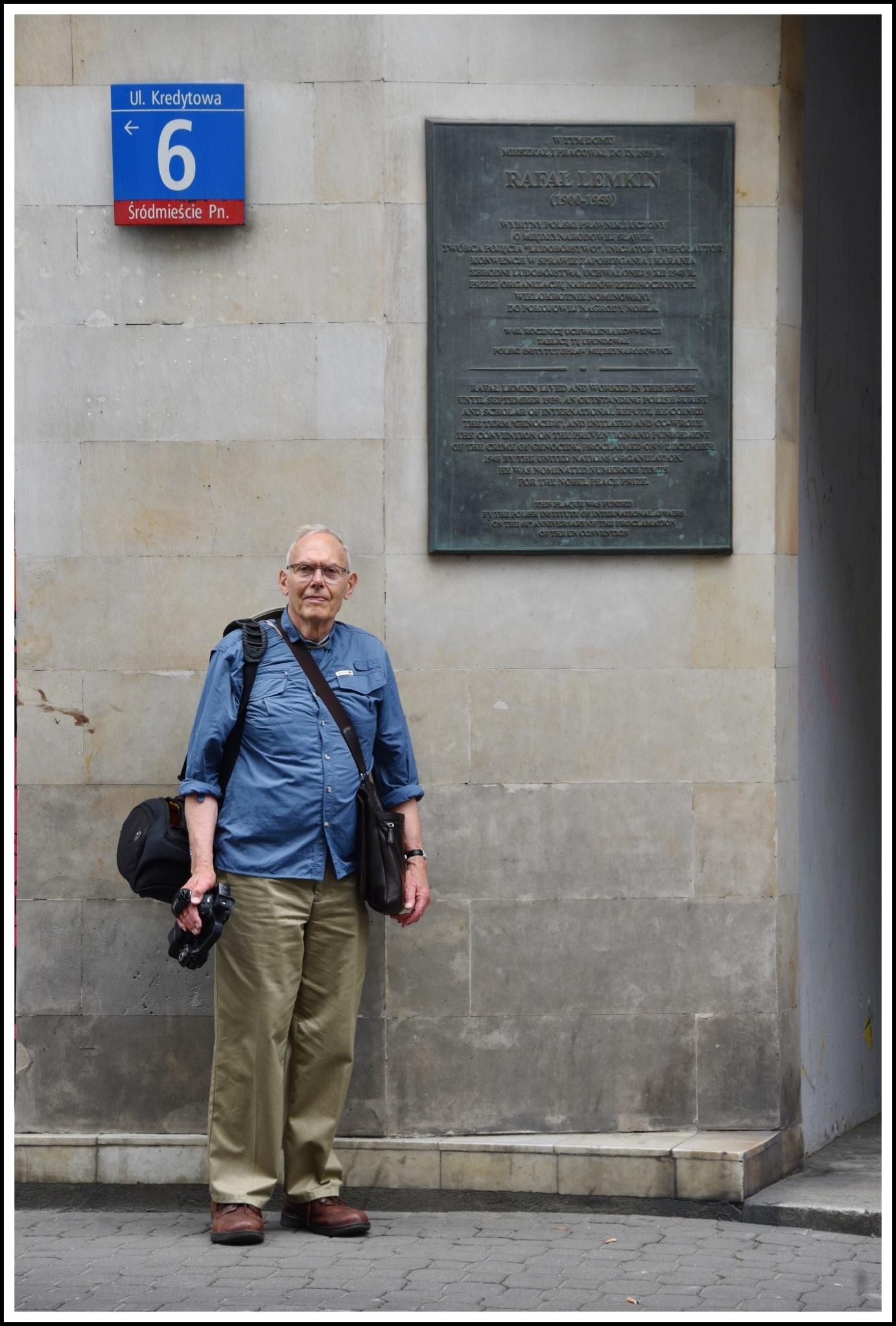 A picture containing text, building, outdoor, person
Description automatically generated