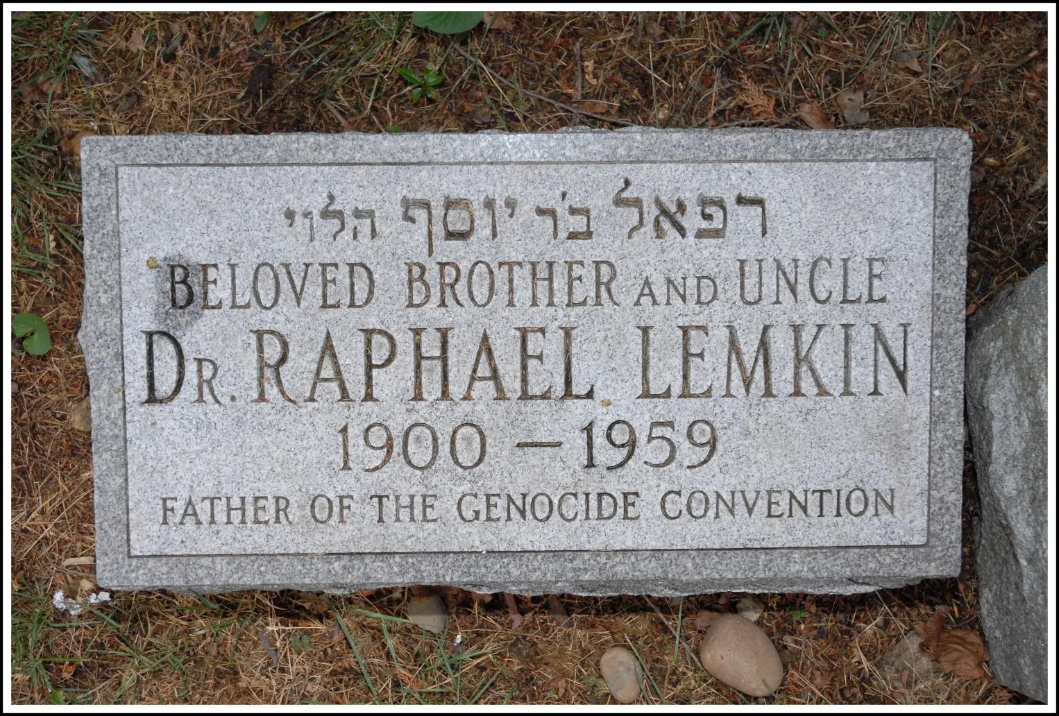 A tombstone with writing on it
Description automatically generated with low confidence