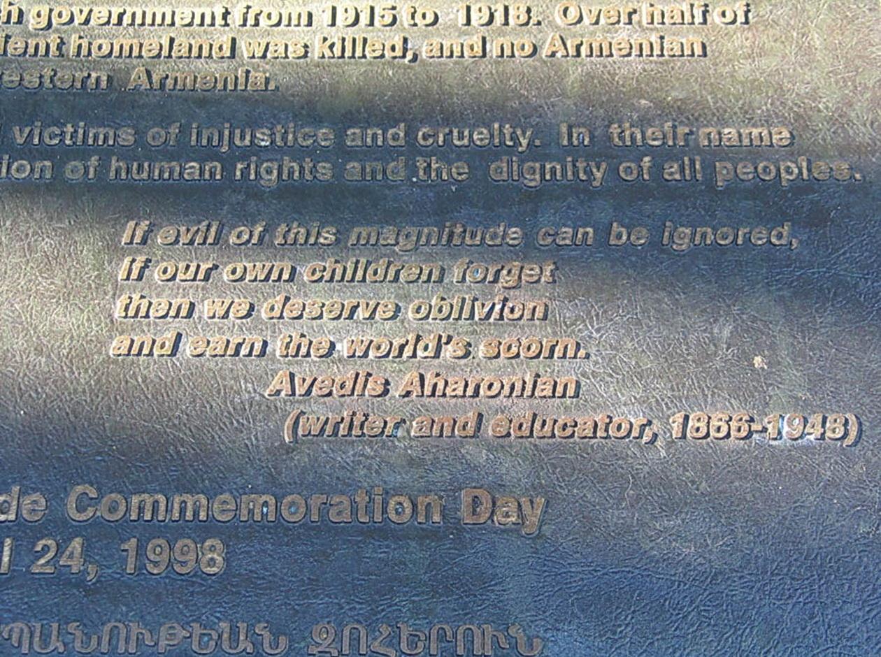 A picture containing text, plaque
Description automatically generated